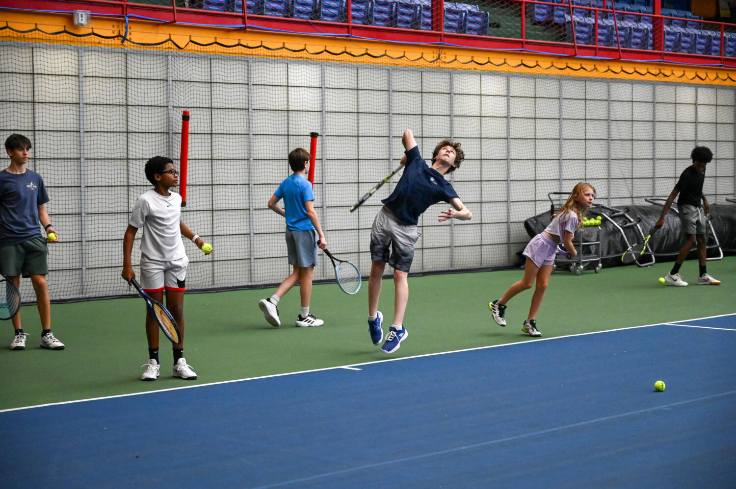 HJTEP Kids and coaches group on court, all looking up at camera